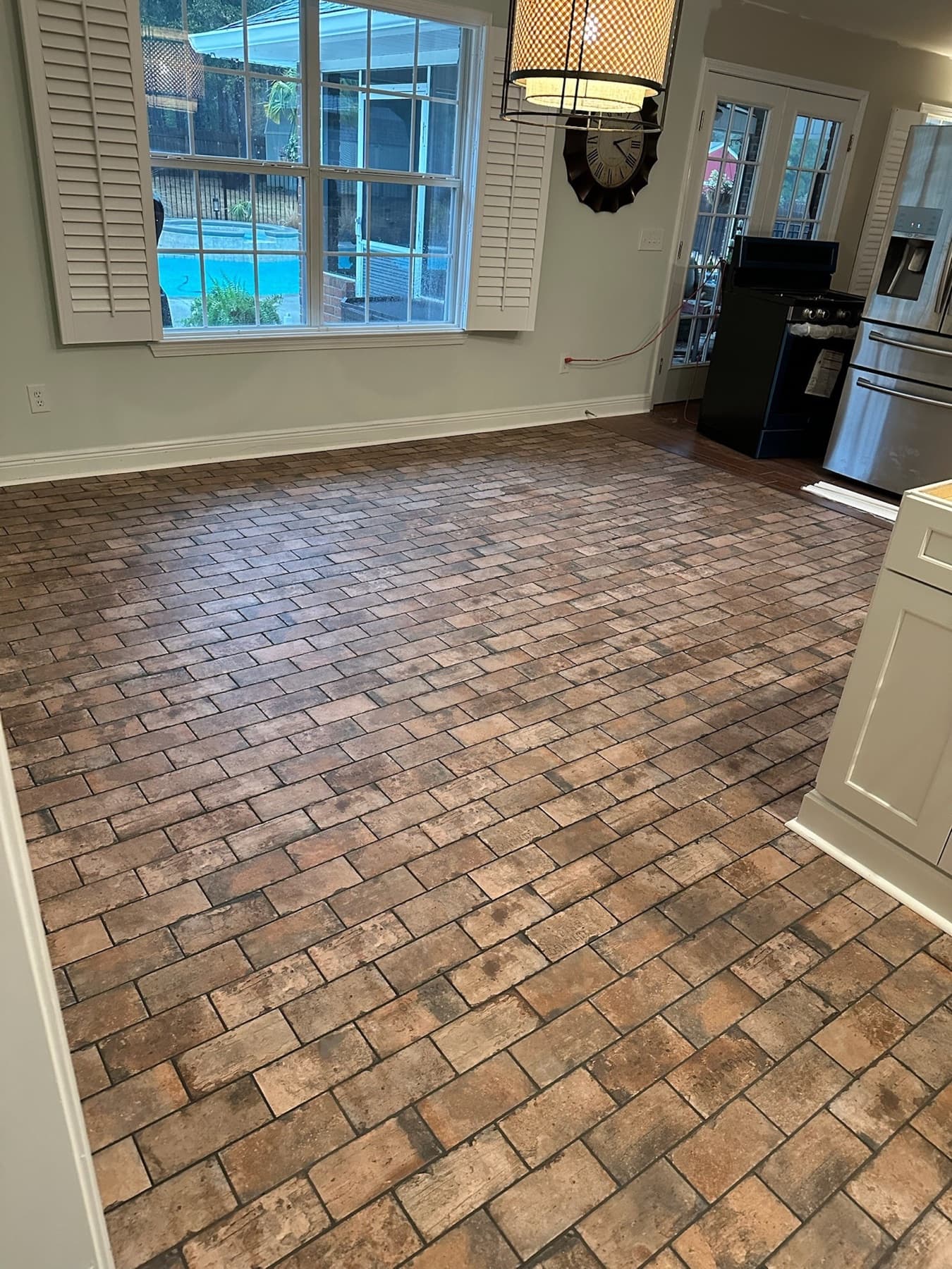 Brick paver floor in a sunlit room in Milton, FL